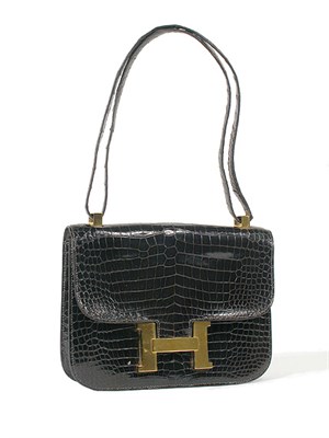Lot 2290 - Hermes Brown Crocodile Constance Bag With gilt-...