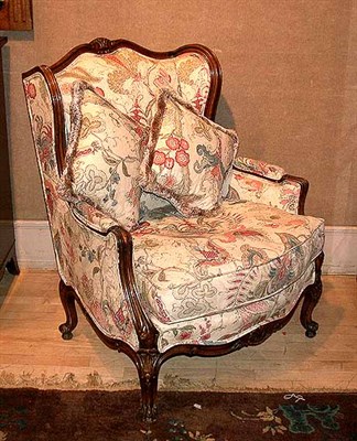 Lot 594 - Two Louis XV Style Upholstered Walnut Bergeres