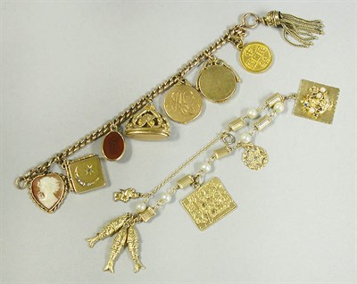 Lot 305 - Four Gold Charm Bracelets