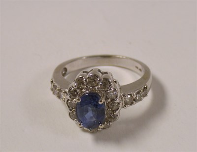 Lot 404 - Sapphire and Diamond Ring