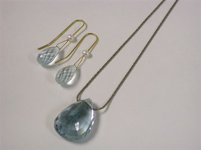 Lot 129 - Blue Topaz Pendant and Pair of Earrings