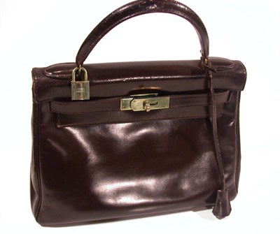 Lot 2283 - Hermes Brown Leather Kelly Purse With lock and...