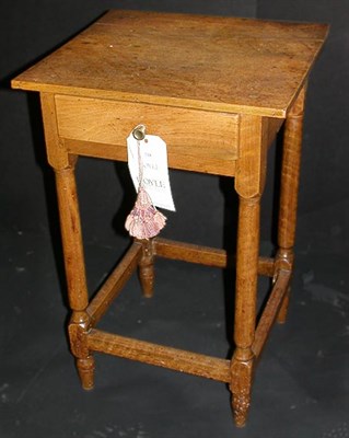 Lot 238 - Walnut One-Drawer Stand The rectangular top...