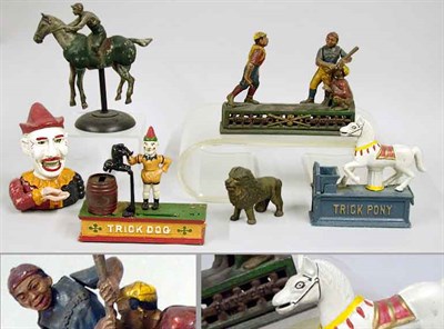 Lot 222 - Group of Six Cast Iron Banks and Toys