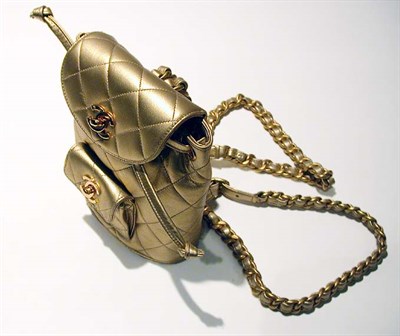Lot 3759 - Chanel Gold Quilted Backpack French, 1990s...
