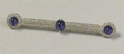 Lot 428 - Cabochon Sapphire and Diamond Bar Pin