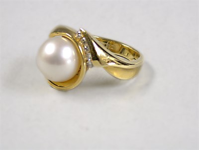 Lot 520 - Cultured Pearl and Diamond Ring