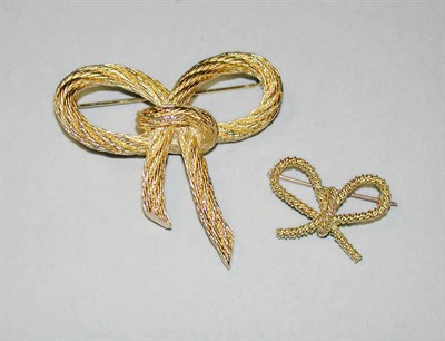 Lot 249 - Two Bow Pins