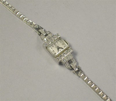 Lot 353 - Lady's Diamond Wristwatch The 14 kt. white...