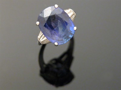 Lot 439 - Sapphire and Diamond Ring Platinum, set with...