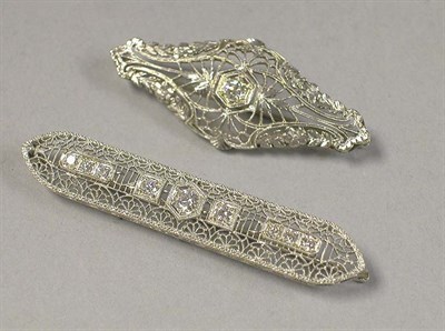 Lot 402 - Two Diamond Filigree Bar Pins The first 18 kt....