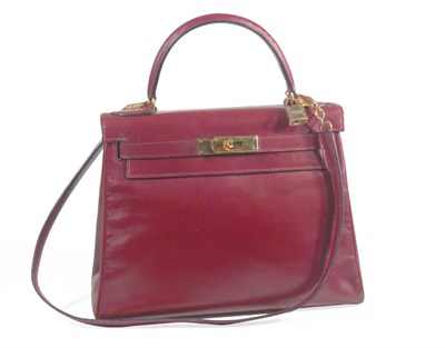 Lot 3740 - Hermes Rouge Leather Kelly Bag With gilt-metal...
