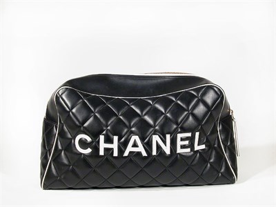 Lot 3770 - Chanel Black Quilted Strapless Duffel Leather...