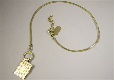 Lot 315 - Gold Key Chain and Locket