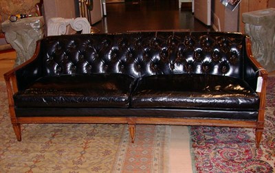 Lot 680 - Neoclassical Style Fruitwood Tufted Leather...