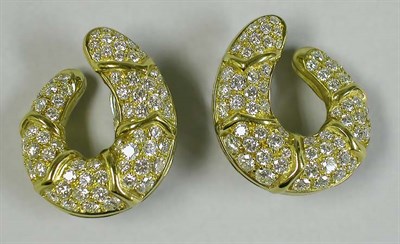 Lot 573 - Pair of Gold and Diamond Hoop Earrings