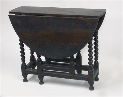 Lot 2067 - Baroque Style Oak Drop-Leaf Gate-Leg Table The...