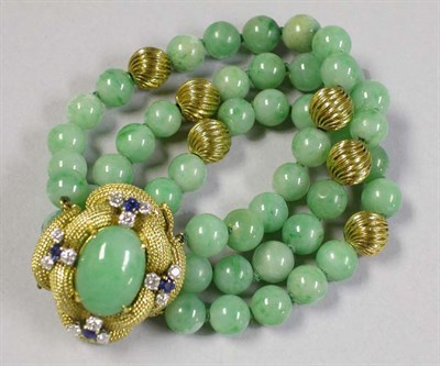 Lot 425 - Jade and Gold Bead Bracelet