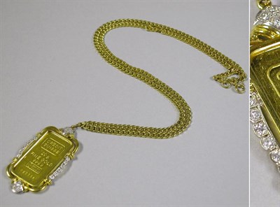 Lot 516 - Gold Ingot Pendant and Chain