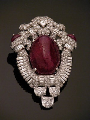 Lot 612 - Cabochon Ruby and Diamond Pendant/Brooch