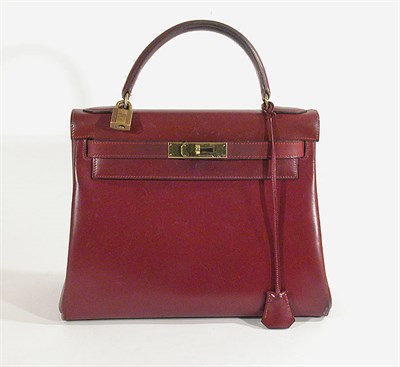 Lot 3742 - Hermes Burgundy Kelly Bag With lock and key in...