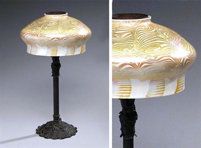 Lot 542 - Quezal Art Glass and Bronze Lamp The opal...