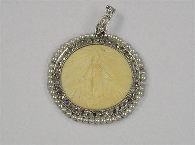 Lot 454 - Ivory, Diamond and Seed Pearl Pendant