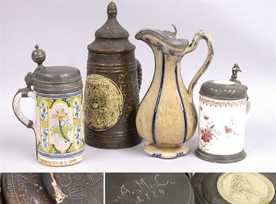 Lot 2270 - Four Continental Steins Three pewter mounted.
