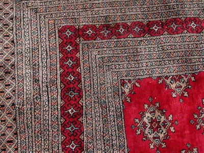 Lot 733 - Pakistan Bokhara Carpet Approximately 11 feet...