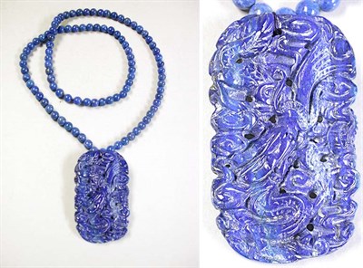 Lot 464 - Carved Lapis Lazuli Pendant and Bead Necklace