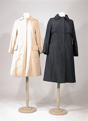 Lot 3582 - Two Hermes Raincoats French, 1970s The first...