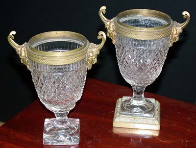 Lot 604 - Two Empire Style Crystal Gilt-Metal Mounted Urns