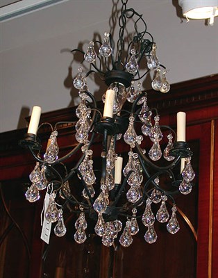 Lot 639 - Louis XV Style Black Painted and Drop Crystal...