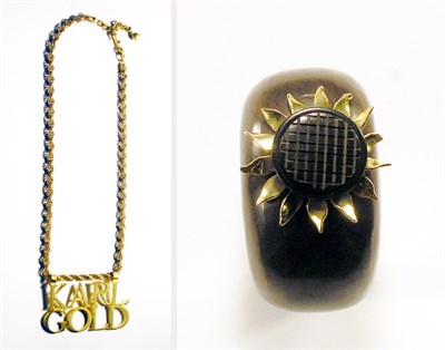 Lot 3319 - Lagerfeld Carved Wood Cuff and Karl Gold...