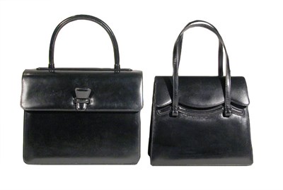 Lot 3687 - Two Nettie Rosenstein Black Calf Handbags...