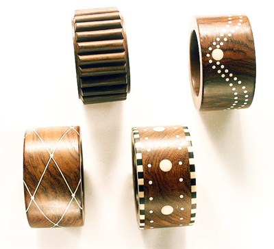 Lot 3349 - Set of Four Correani Wooden Bracelets Italy,...