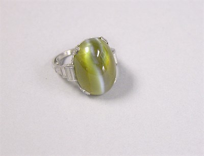 Lot 494 - Chrysoberyl Cat's-Eye and Diamond Ring