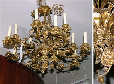 Lot 404 - Louis XV Style Gilt-Metal Twelve-Light Chandelier