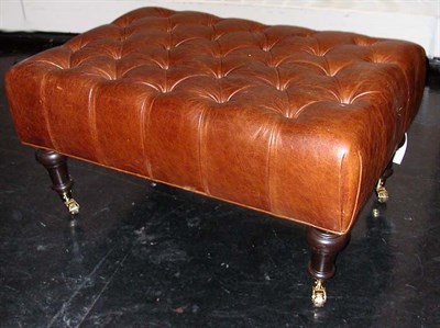 Lot 2606 - Button Tufted Leather Ottoman