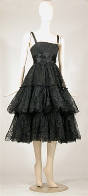 Lot 3455 - Traina-Norell Black Lace Baby Doll Dress...