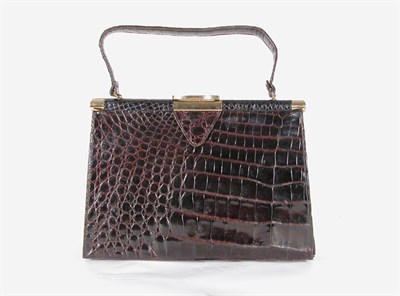 Lot 3693 - Vassar Brown Alligator Handbag American, 1940s...