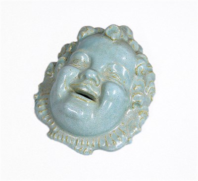 Lot 2611 - Unsigned Glazed Faience Mask Depicting a happy...