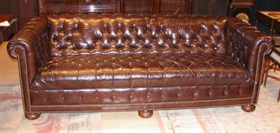 Lot 544 - Faux Leather Upholstered Chesterfield Sofa