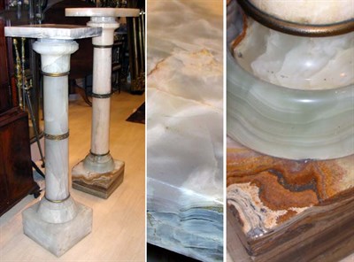 Lot 499 - Two Gilt-Metal Mounted Onyx Pedestals
