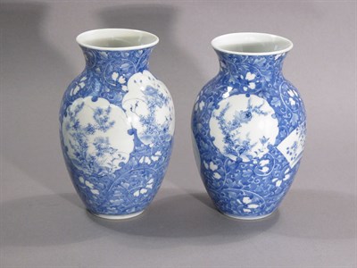 Lot 4240 - Pair of Japanese Blue and White Glazed Vases...