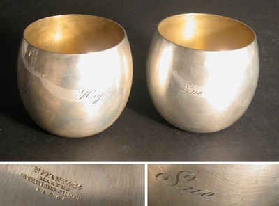 Lot 2765 - Pair of Tiffany & Co. Sterling Silver Tumblers...
