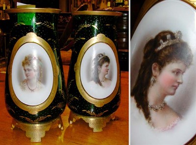 Lot 425 - Pair of Green Glass Portrait Vases