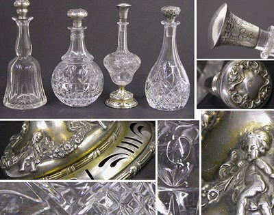 Lot 2302 - Four Clear Glass Decanters Each with a...