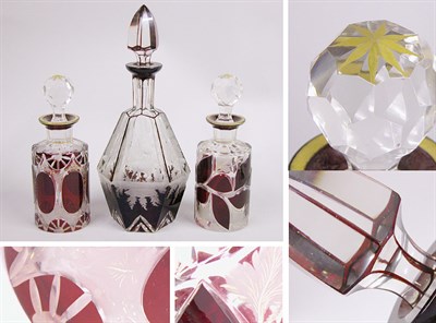Lot 2303 - Three Ruby Cut to Clear Glass Decanters Height...