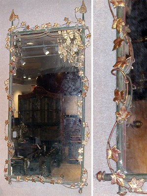 Lot 559 - Painted Metal Foliate-Decorated Mirror
